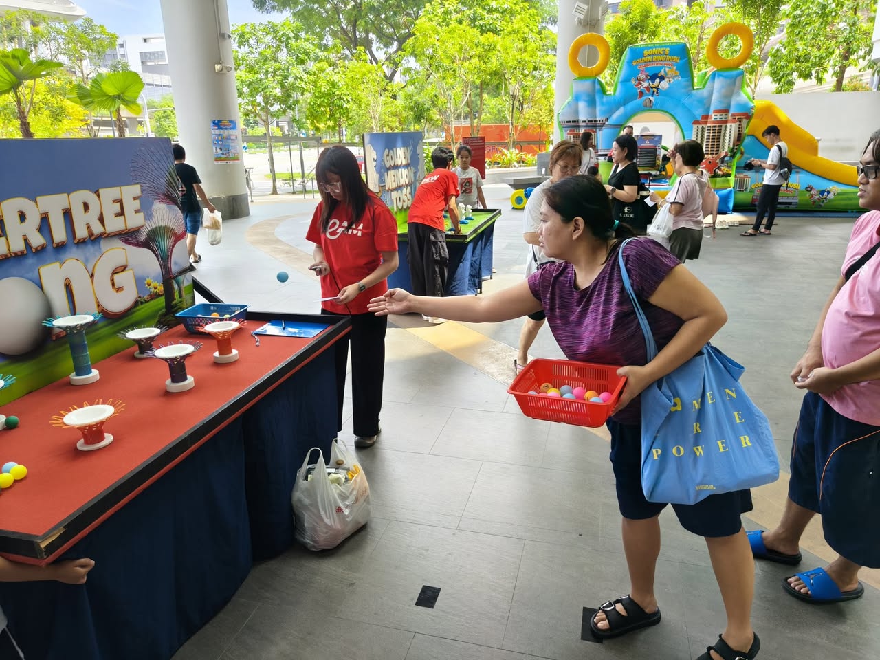 Participants celebrating wins at the Sonic's Golden Ring Rush event